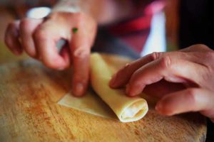 Learning to roll spring rolls